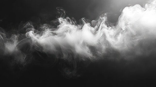 White smoke swirling and drifting over a dark background creating soft abstract patterns and textures