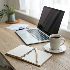 Desk with laptop notebook pen and coffee cup on wooden table