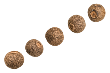 A collection of whole allspice berries isolated on a transparent background.
