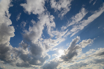 Vibrant and Colorful Clouds Underneath a Beautiful, Clear Blue Sky that Stretches Vastly