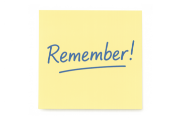 Yellow sticky note showing remember! written in blue pen, symbolizing a reminder or important memory