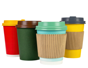 Four colorful to-go coffee cups with different lids and a corrugated sleeve