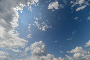 A truly beautiful cloudy sky that captivates the viewer with glorious sunlight shining through