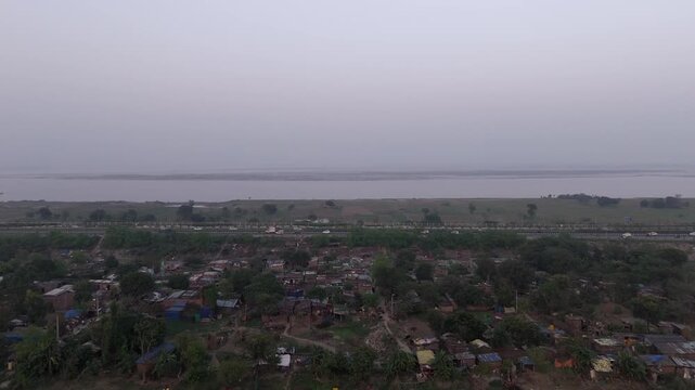 Slums near JP Ganga Path expressway near Ganga river basin, Patna, Bihar, Drone shot