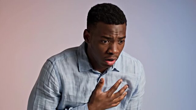 Concerned Black Man Experiencing Chest Pain and Distress: Health and Medical Concern