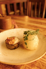 An authentic restaurant in a historic European city. Traditional Lithuanian dishes and a cup of coffee in a  old restaurant. Traditional Belarusian potato dishes. June 1, 2025, Vilnius, Lithuania