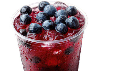 Fresh organic blueberries and raspberries in a white bowl with yogurt and jam are a healthy, sweet summer dessert