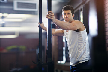 Portrait, athlete and man on break, serious and wellness with workout routine, confident and...