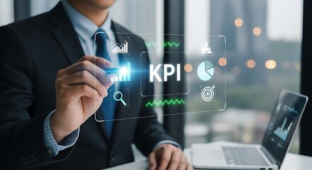 Businessman analyzing key performance indicators with digital interface for business growth