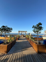 Fototapeta premium Beachfront wooden path. High quality photo
