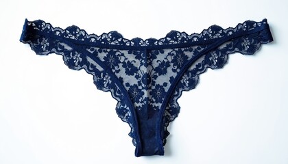 Dark blue lace thong underwear. Elegant female lingerie made from sheer fabric with floral patterns. Intimate apparel isolated on white studio background.