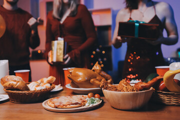 Festive Office Christmas Party with Delicious Food. A beautifully decorated office space with Christmas trees and festive lights, set up for a holiday party.