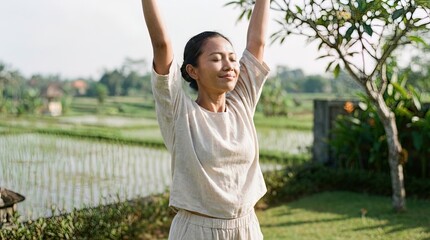 A serene woman in a bright day stretching in the tranquil garden, embracing the vitality of nature.