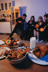 Friends enjoying a Halloween party at a bar making a toast