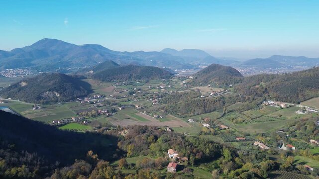 Aerial drone footage from Monte Ceva, Colli Euganei: rolling hills, volcanic peaks, forests and wide panoramic views. Ideal for nature, travel and landscape stock footage.
