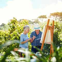 Happy, painting and senior couple in garden for bonding with hobby, creativity and artwork. Retirement, marriage and elderly man and woman with canvas for drawing, picture and art skill outdoor © ReeseBuyout3/peopleimages.com