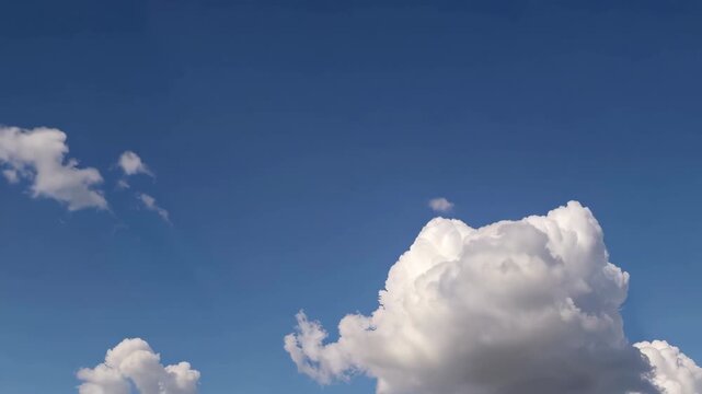 Floating Clouds in a Clear Blue Sky