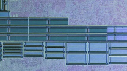 Microchip integrated circuit architecture under microscope