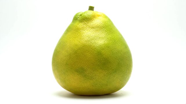 Fresh pomelo fruit with vibrant yellow-green skin isolated on a clean white background, emphasizing healthy eating and natural citrus appeal