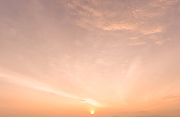 Beautiful morning or evening orange or red sky taken at the sea while sunsets or sunrises used as natural background texture in decorative art work