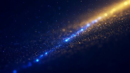 Abstract background of glowing blue and yellow particle stream moving diagonally across a dark blue cosmic space with bokeh effect