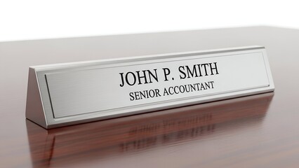 A desk nameplate with "John P. Smith, Senior Accountant" sits on a polished wooden surface