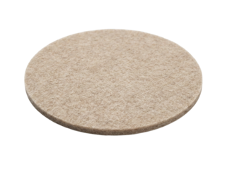 Round furniture felt pad providing scratch protection with uniform texture, subtle fiber detail and neat minimal shape, isolated on white and transparent background, PNG premium cutout
