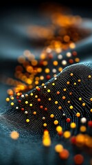 Abstract waves with golden, orange, and white spheres rising, flowing from a granular field