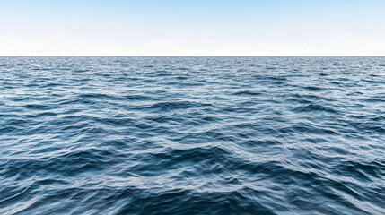 Fototapeta premium Open ocean calm blue sea horizon with gentle waves, serene mood