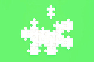Jigsaw puzzle with missing piece on green background. Opportunities for green issues environmental problem solving concept.