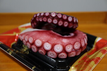 Steamed octopus legs sashimi block purchased at a supermarket in Tokyo, Japan