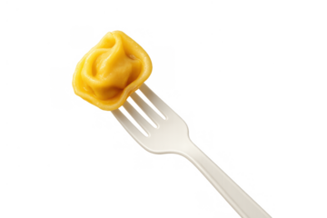 Single tortellino on white plastic fork, traditional italian pasta dumpling, ready for eating, transparent background