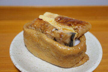 Unagi and dashimaki inarizushi purchased at a supermarket in Tokyo, Japan