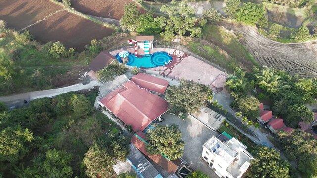 aerial view of a small resort and village of india