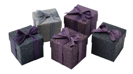 Group of five textured gift boxes with bows isolated on transparent background