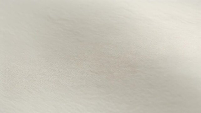 Neutral beige abstract textured backdrop with a soft and gentle surface. A clean, minimalist, and versatile background for creative projects
