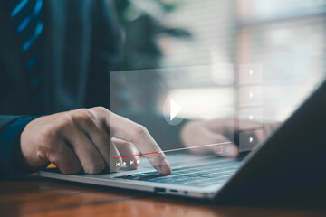 businessman using a laptop, video music player interface, concept of digital content creation,...