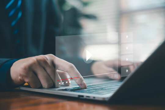 businessman using a laptop, video music player interface, concept of digital content creation, online media streaming, virtual webinar education on a live platform, multimedia technology business