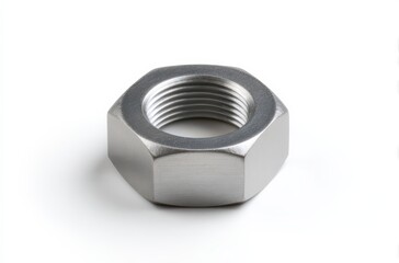 Hexagonal Steel Nut: An isolated shot of a shiny hexagonal steel nut. Threads are clearly visible, highlighting the precision of the manufacturing process.