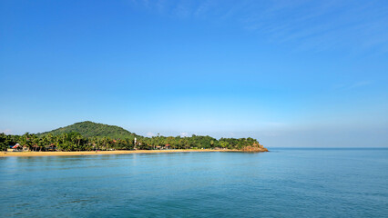 Mae Nam Beach with palm trees in the light of sunset, Island Ko Samui, Surat Thani, Thailand.