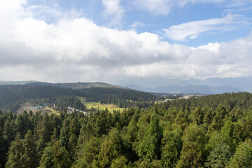 Tourist bus travel at Fairy Mountain National Forest Park in Wulong, Chongqing, China.