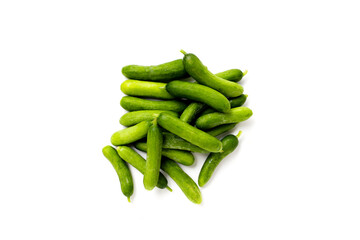 Fresh mini baby cucumbers on white background