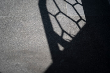 shadow of a fence
