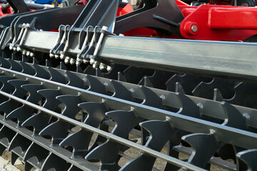 Close-up of a large modern subsoiler for cultivating the land.