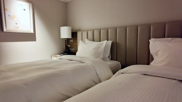 Twin beds in a hotel bedroom