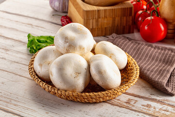 Raw white champignon mush heap