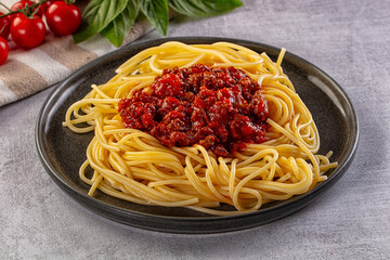 Italian pasta spaghetti bolognese with minced beef meat and tomato sauce