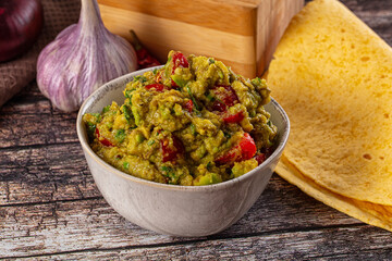 Green spicy Mexican guacamole dip