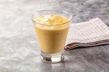 Sweet mango smoothie dessert glass