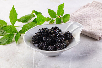 Raw sweet juicy blackberry in the bowl